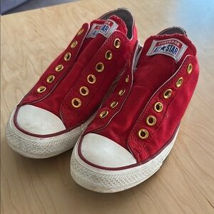 Converse Red Canvas Slip-Ons with Gold Eyelets